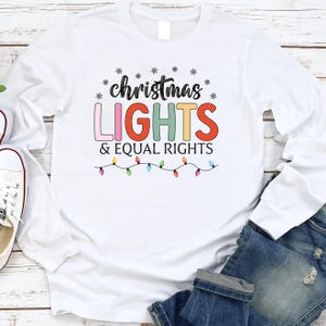Christmas Lights and Equal Rights Long Sleeve Shirt, Xmas Kindness Sweatshirt, Merry Christmas Shirt, Happy Holiday Hoodie, Christmas Gifts