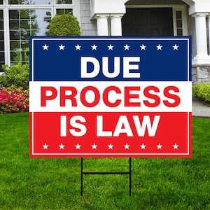May include: A red, white, and blue yard sign with the text "DUE PROCESS IS LAW" in white letters. The sign has a row of white stars on the top and bottom borders.