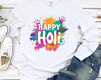 May include: White long-sleeve t-shirt with a colorful watercolor design and the text "Happy Holi" in white.