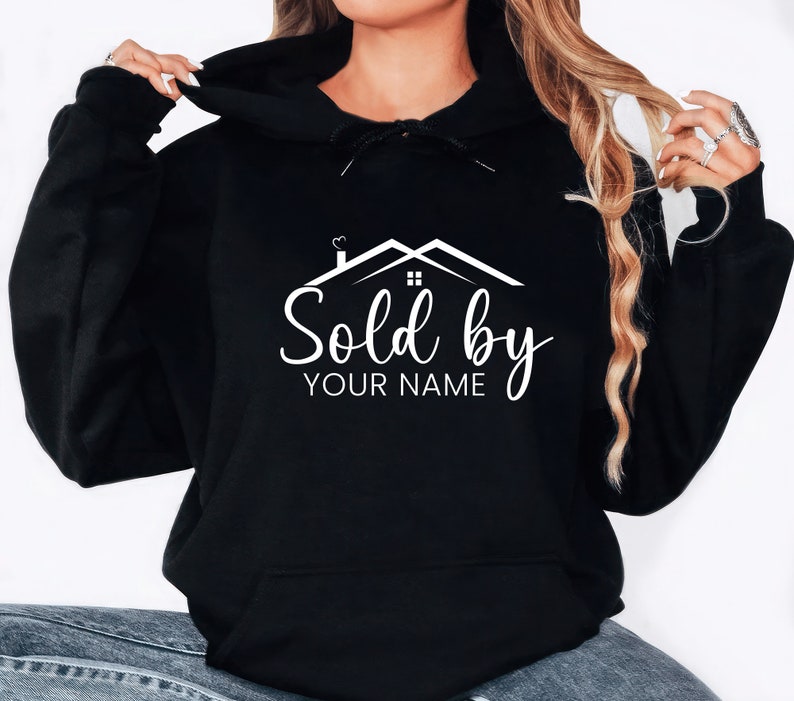 May include: Black hooded sweatshirt with a white graphic of a house with the text "Sold by YOUR NAME".