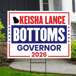 May include: A political campaign sign with the name "Keisha Lance Bottoms" in large white letters on a blue background. The sign also includes the word "Governor" and the year "2026". The sign is red and white with a black outline of the state of Georgia.