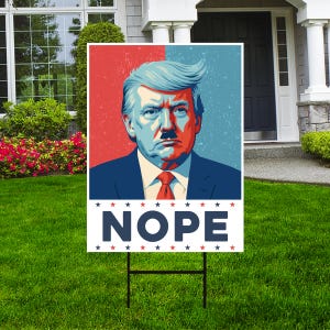 May include: A red, white, and blue yard sign with a picture of a man with a mustache and the word "NOPE" in large, bold, blue letters.