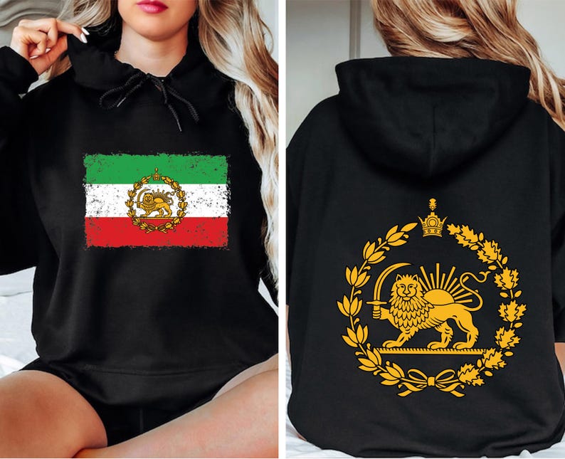 May include: Black hoodie featuring the Iranian flag on the front, with green, white, and red stripes and a lion emblem. The back displays a gold lion emblem within a wreath. The hoodie has a drawstring hood.
