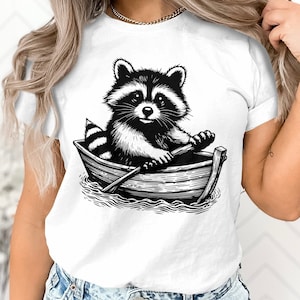 Funny Cute Raccoon Riding Boat Animal Lover Gift Men Women T-Shirt Sarcastic Raccoon Boat Holiday Birthday Present Tshirt