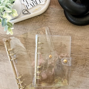 Pasta transparente de PVC GOLD com 6 argolas | A6 ou A5