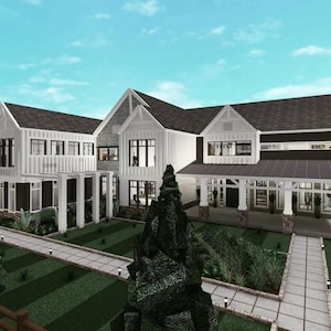 May include: A white farmhouse with a large front porch and a grey roof. The house has a large garden with green grass and a small tree in the front.