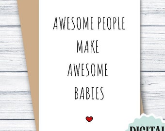 May include: A white card with black text that reads "Awesome people make awesome babies" with a small red heart at the bottom. The card is sitting on a brown envelope. The text "Digital Download JPG+PDF" is in a circle on a light blue background.