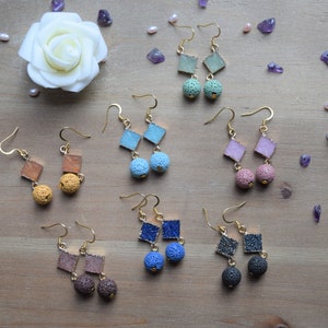 May include: Assortment of earrings with lava rock and geometric glass beads. The earrings are available in a variety of colours, including blue, green, pink, and brown.