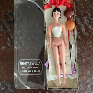 Vintage 1960’s Popi Doll with Wigs and Clothes- damaged eye