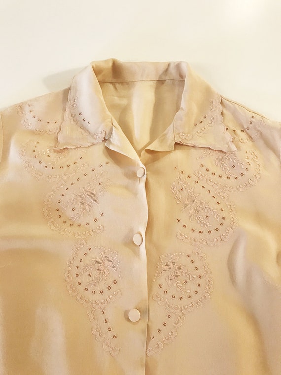 Embroidered pastel pink silk shirt
