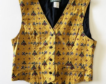 Chaqueta provenzal vintage Souleiado años 90 sin mangas, chaleco con estampado provenzal en algodón negro y amarillo con estampado multicolor, talla L.