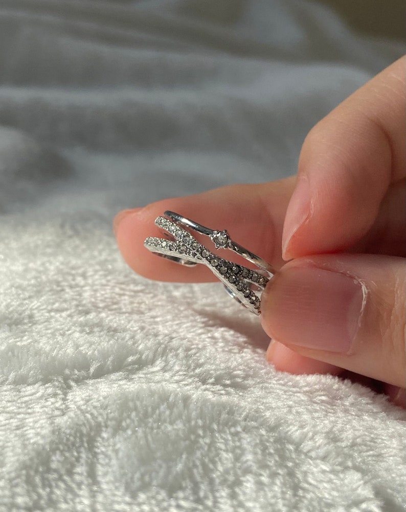 Double cross over silver ring