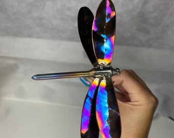 Stainless steel iridium coloured rainbow heat treated dragonfly.