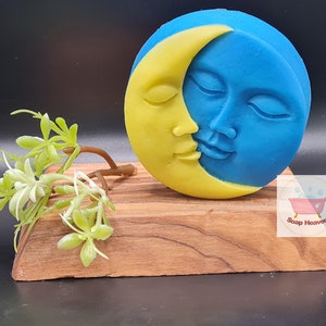 Stunning moon shaped soap.  Main soap face in blue with a crescent moon face on top in striking yellow colour
Made in Purple Rain fragrance