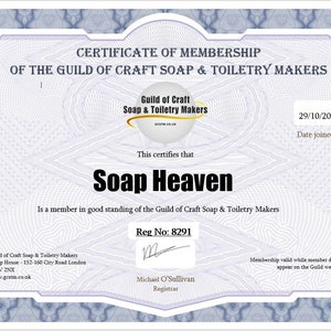 May include: A certificate of membership from the Guild of Craft Soap & Toiletry Makers, featuring a blue decorative border. The certificate states "Soap Heaven" as a member, with the date 29/10/2021. The document includes the Guild's logo.