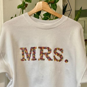 Floral hand embroidered crewneck sweatshirt, monogram, college, word custom embroidery
