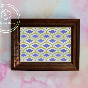 May include: A framed cross-stitch pattern with a geometric design featuring purple and gold squares.