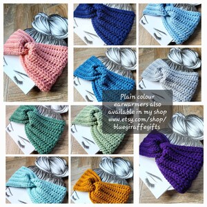 May include: A collection of crocheted ear warmers in various colors, including blue, pink, gray, green, purple, and yellow. The ear warmers are made with a knot design and are available in plain colors. The text "Plain colour earwarmers also available in my shop www.etsy.com/shop/bluegiraffegifts" is displayed on the image.