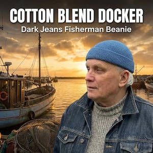 May include: A blue cotton blend docker, or fisherman's beanie, is shown. The image text reads "Cotton Blend Docker" and "Dark Jeans Fisherman Beanie". The beanie is worn by a person in a denim jacket. The background shows boats and a sunset.