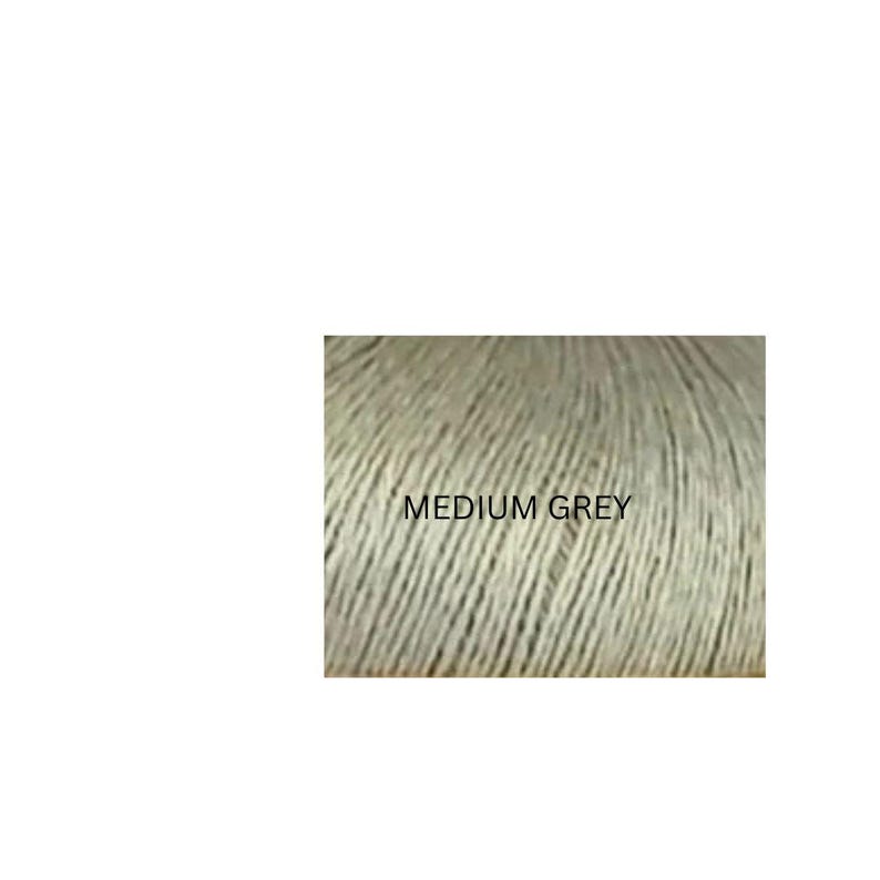 May include: A swatch of medium grey yarn featuring a tightly twisted, multi-ply fiber construction. The texture is uniform and fibrous, displaying a consistent neutral tone throughout the material. The text MEDIUM GREY is printed in black.