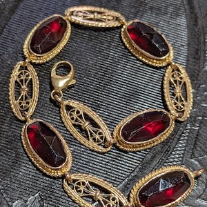 18k guld filigran & granat armband från katalanska traditionella katalanska smycken 18k guld och folierad granat armband