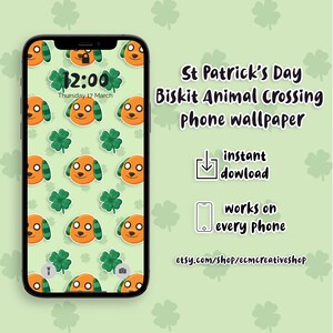May include: A phone wallpaper featuring a cartoon dog with a green shamrock pattern. The wallpaper is designed for St. Patrick's Day and features the text "12:00" and "Thursday 17 March".