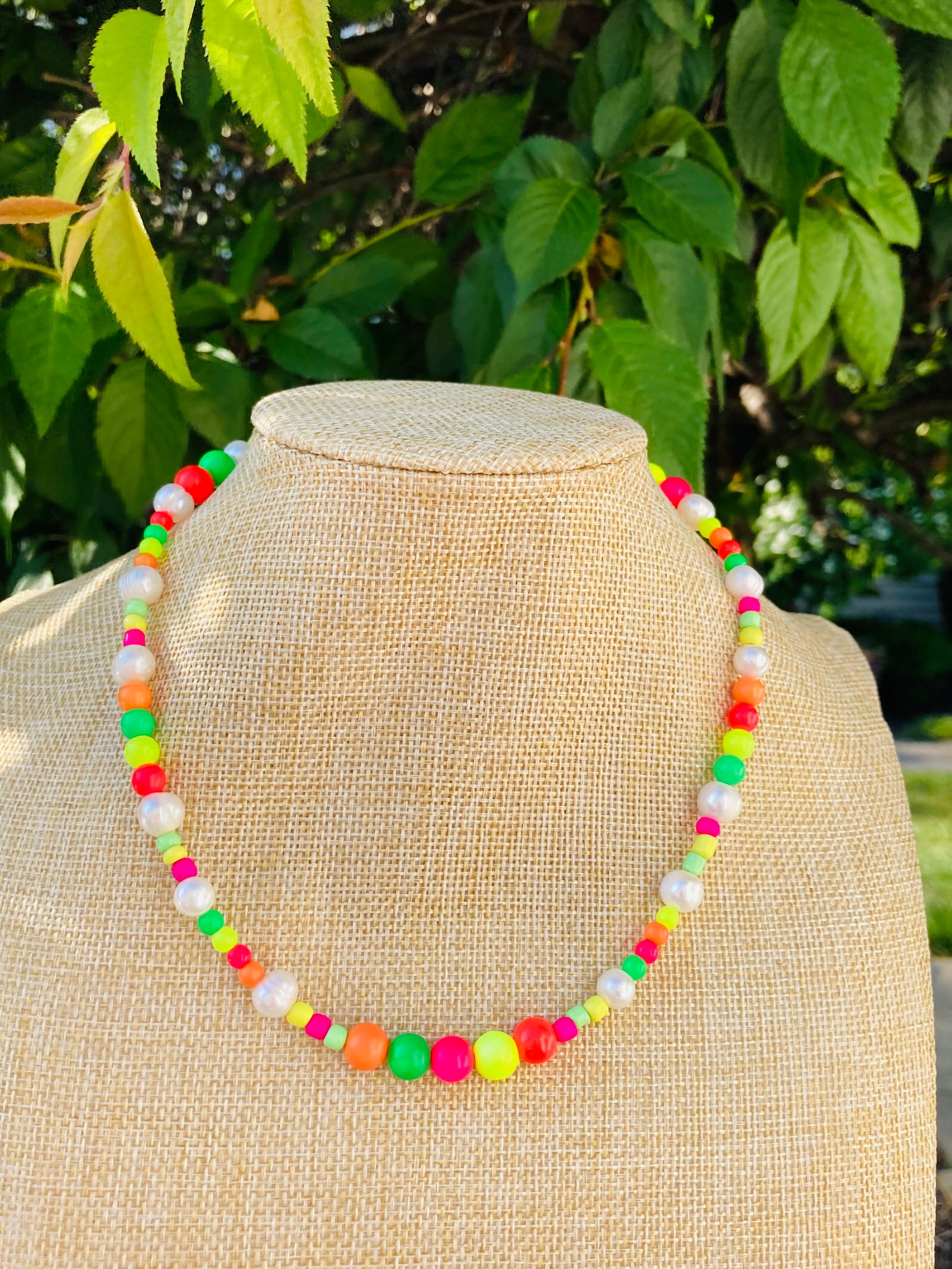 Neon beaded necklace with pearls, perfect for a Y2K-inspired look