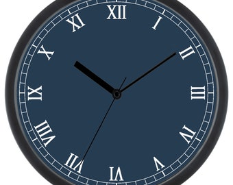 May include: A round, black framed clock with Roman numeral markings on a dark blue face. The clock hands are black.