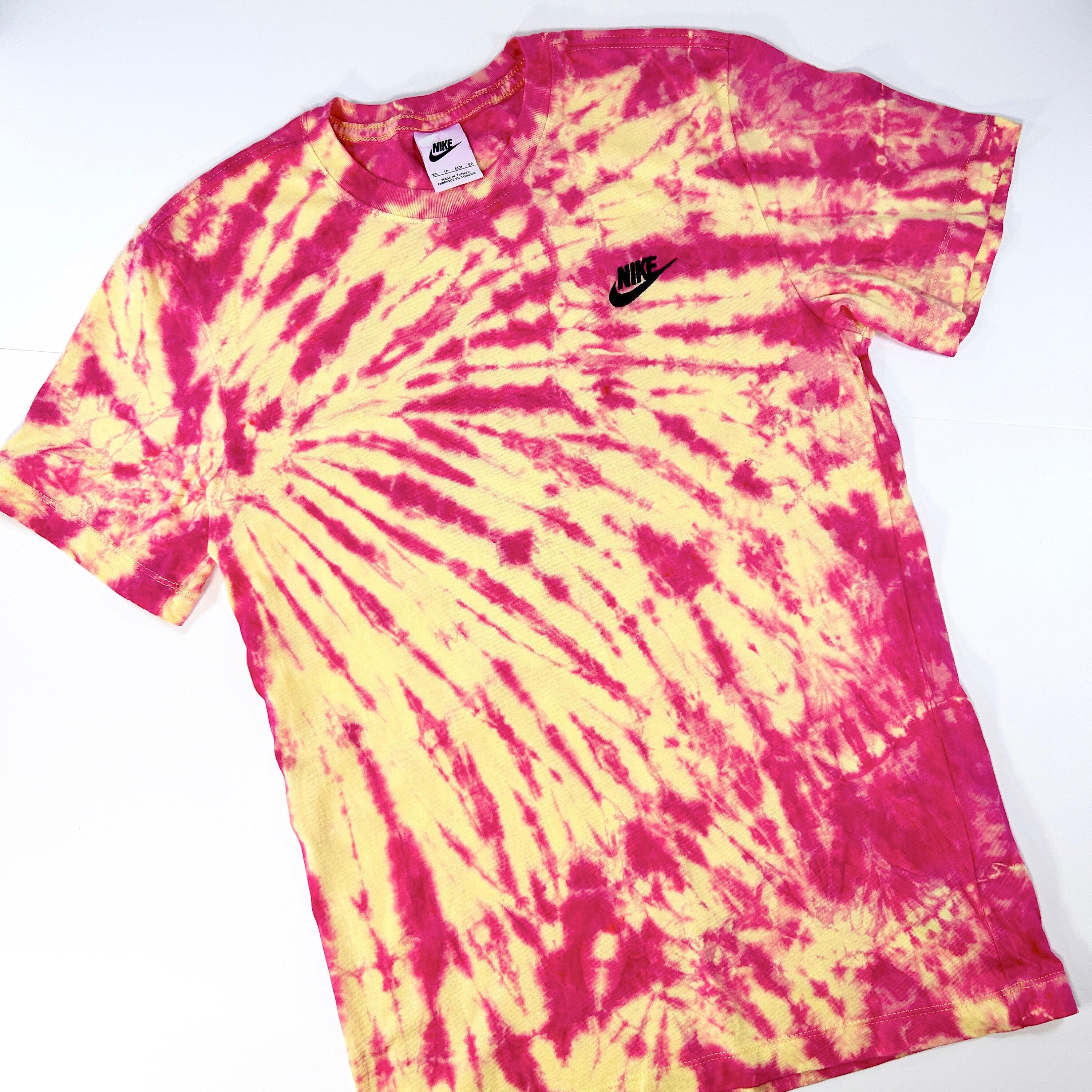 Pink and yellow nike shirt hotsell