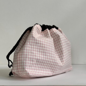 Pastel check medium drawstring toiletry/wash bag with waterproof lining