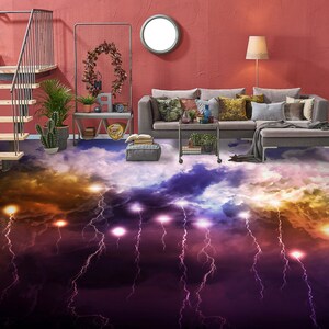 May include: A living room with a sectional sofa and a cloud-like floor with lightning bolts. The floor is a 3D printed design with a purple, blue, and yellow color scheme. The sofa is gray and has pillows in various colors. The room has a red wall and a window with a white circle in the middle. There is a lamp on the right side of the image.