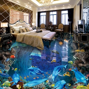 May include: A bedroom with a blue and green 3D floor design featuring dolphins, fish, and coral. The floor looks like an underwater scene.