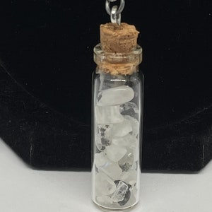 silver curb link chain moonstone in a glass bottle necklace