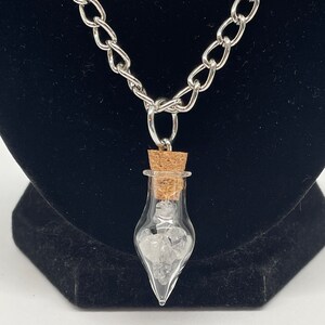 silver curb link chain black rutilated quartz in a teardrop glass bottle necklace