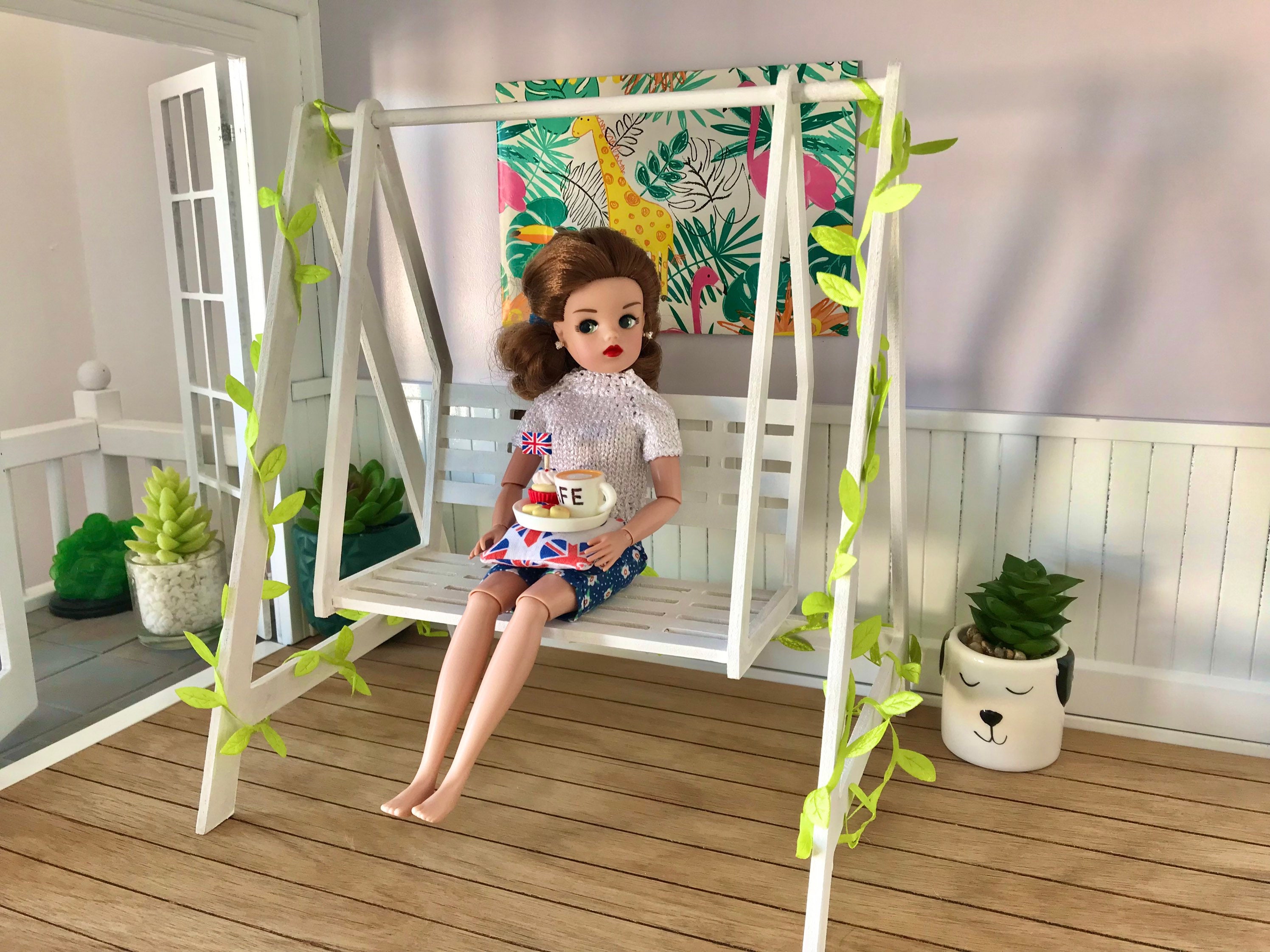 Miniature dollhouse Child in Swing 