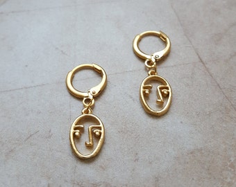 pair of 14k gold plated face outline charm huggie hoop earrings | handmade minimalist dainty human face earrings