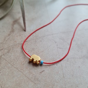 14k gold plated elephant charm red string necklace | handmade dainty blue beaded adjustable red cord choker jewelry