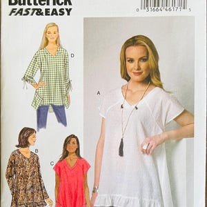 May include: Butterick B6215 sewing pattern featuring various tunic tops. The pattern includes designs with V-necks, short and long sleeves, and decorative details. The size range is Lrg-Xlg-Xxl.