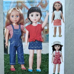 May include: Simplicity sewing pattern S9415 for 14-inch doll clothes. The envelope features illustrations of dolls wearing various outfits including denim overalls, a red tie-front top, a blue patterned skirt, a white tank, and a floral romper.