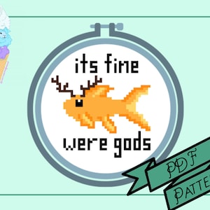 Pode incluir: Um padrão de ponto cruz digital em PDF com um peixe laranja pixelado com chifres dentro de um círculo. O texto diz "its fine were gods". Uma casquinha de sorvete extravagante com bolas em forma de lhama está no canto superior esquerdo. Uma faixa verde diz "PDF PATTERN".