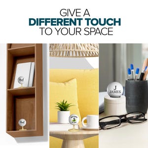 May include: Three white golf balls with personalized text on a stand. The golf balls are displayed on a shelf, a table, and a desk. The text on the golf balls reads "Dad", "Best Papa My Par", and "J James".