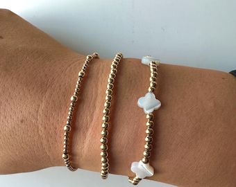 Pulsera de cuentas doradas apiladas (3 piezas)