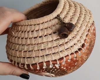 Handmade clay base aboriginal weaving basket with raffia & gum nuts