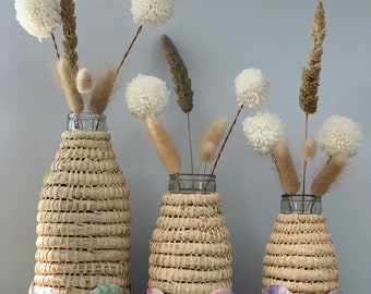 Handmade woven vintage milk bottle with clay sea urchins Aboriginal weaving