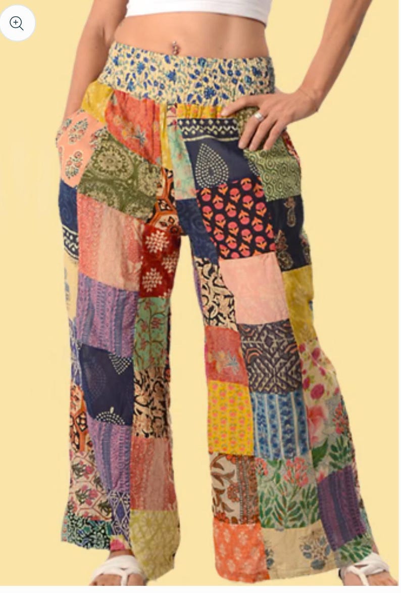 May include: Patchwork pants with a colorful, multi-patterned design. The pants have a wide leg and a comfortable elastic waistband.