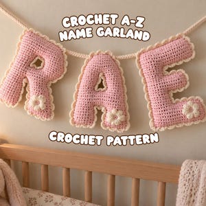 May include: A crochet name garland spelling RAE in pink yarn with cream-colored scalloped edges and small flower accents, suspended from a cream yarn string. The text CROCHET A-Z NAME GARLAND and CROCHET PATTERN is visible in the image.