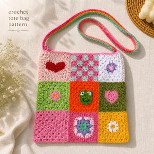May include: A colorful crochet tote bag pattern. The bag features a patchwork design with squares of pink, green, orange, and white, each with a different motif, including hearts, flowers, and a frog. The strap is rainbow-colored, and the text "crochet tote bag pattern" is visible.