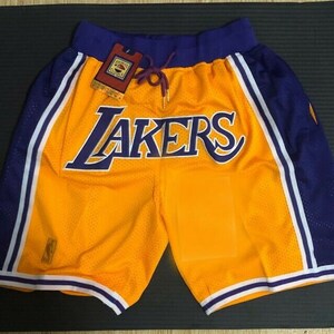 black and yellow lakers shorts