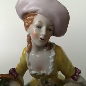 Sitzendorf Pottery Marked Lady with Basket of Flowers Porcelain Figurine