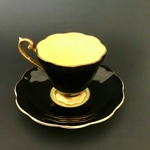 Rare: Vintage Black Tea Cup Yellow background Inside, Gold Trim and Saucer, created by Royal Standard Bone China of England.